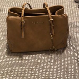 Nice tan Michael kora purse